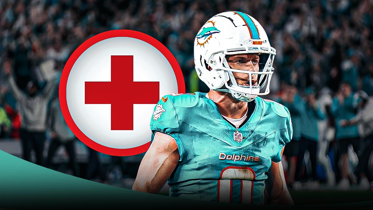 Braxton Berrios in a Miami Dolphins uniform with a red and white first aid symbol as the Dolphins lost Berrios to injury, the latest of the dolphins injuries after tua taovailoa.