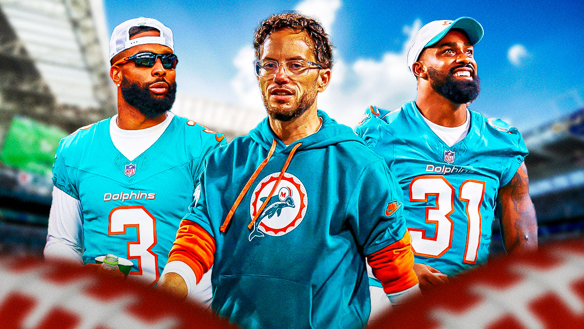 Mike McDaniel in Dolphins coaching gear, Odell Beckham Jr. and Raheem Mostert.