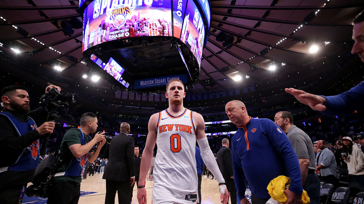 New York Knicks guard Donte DiVincenzo (0) leaves the court after losing game seven of the second round of the 2024 NBA playoffs to the Indiana Pacers at Madison Square Garden.