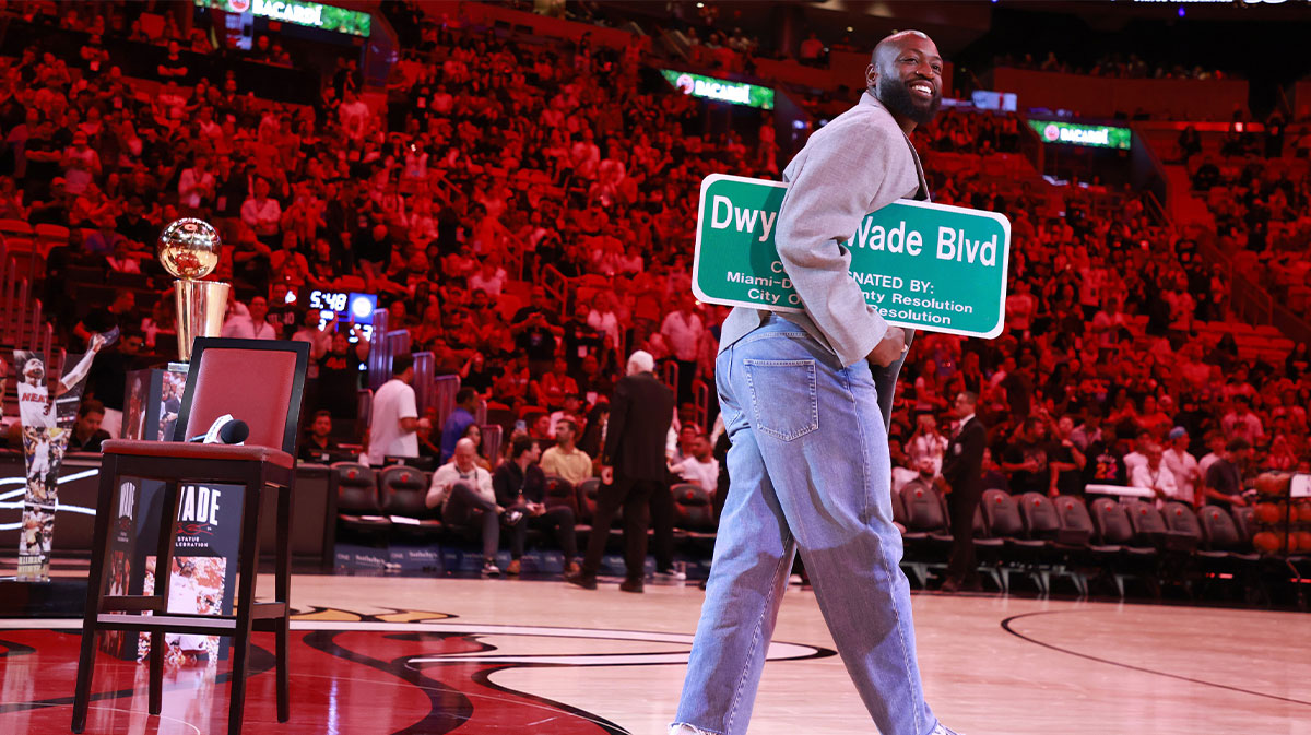 Former Miami Heat guard Dwyane Wade is honored with 'Dwayne Wade Blvd' at halftime during a game against the Detroit Pistons at Kaseya Center.