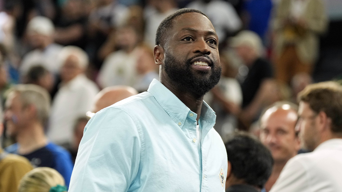 Dwyane Wade looks on at halftime between France and Canada in a men’s basketball quarterfinal game during the Paris 2024 Olympic Summer Games at Accor Arena