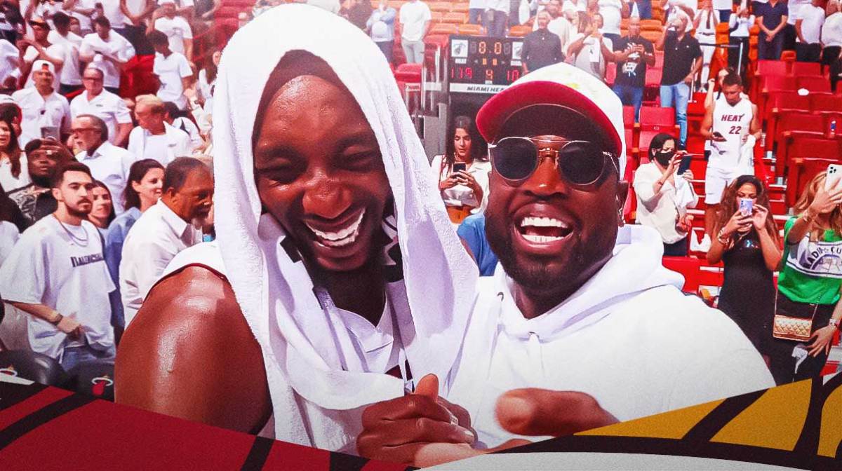 Miami Heat legend Dwyane Wade and Bam Adebayo in front of Kaseya Center.