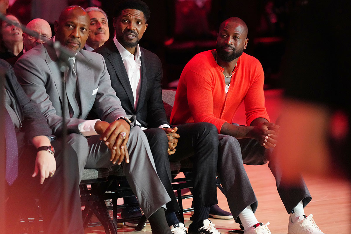 Miami Heat greats Alonzo Mourning, Udonis Harlem, and Dwyane Wade attend the Pat Riley Court dedication ceremony at halftime at Kaseya Center.