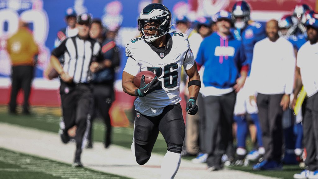 Philadelphia Eagles running back Saquon Barkley (26) carries the ball against the New York Giants during the first half at MetLife Stadium.