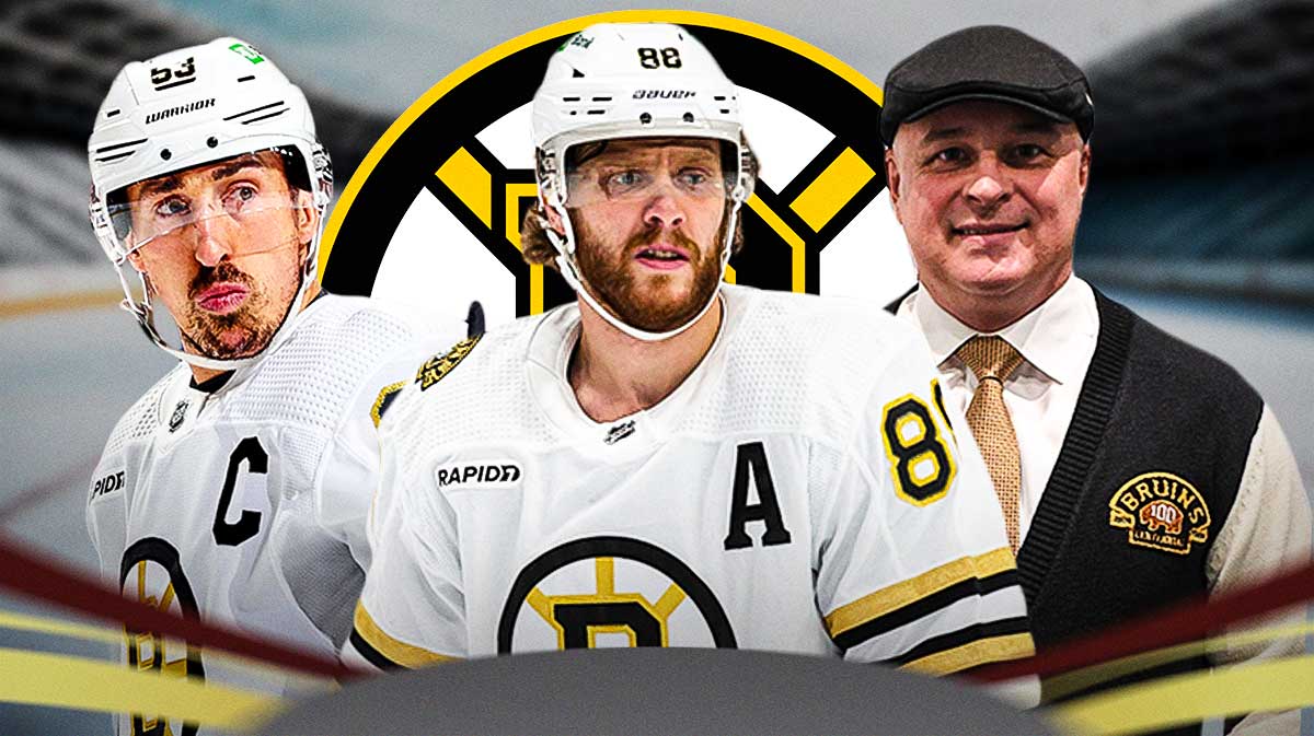 Brad Marchand, David Pastrnak, and Jim Montgomery in front of a bruins logo.
