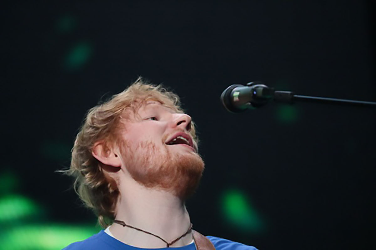 Ed Sheeran performing on his Divide Tour at Miller Park in 2018.