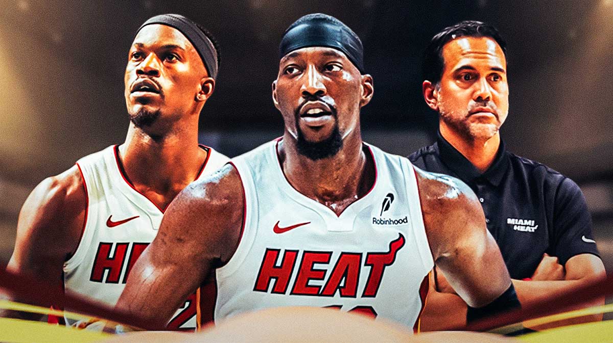 Miami Heat star Bam Adebayo in the middle with Erik Spoelstra and Jimmy Butler on either side in front of Kaseya Center.