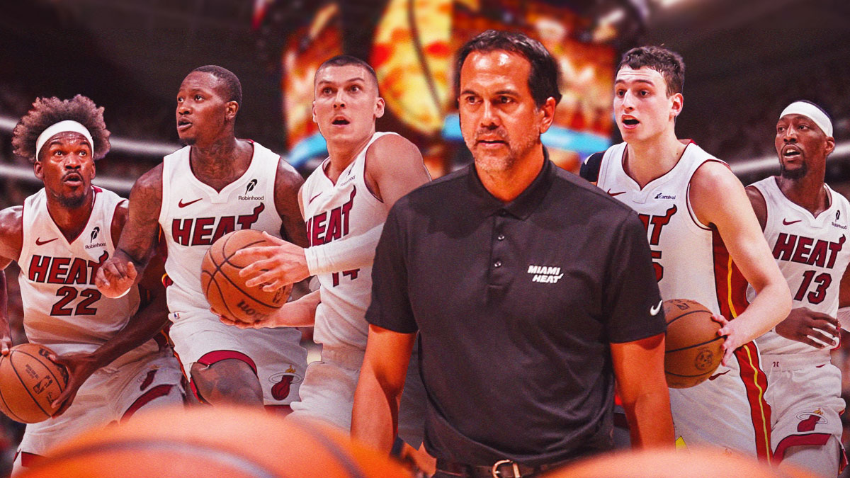 Miami Heat head coach Erik Spoelstra and Nikola Jovic in the center with Bam Adebayo, Tyler Herro, Terry Rozier, and Jimmy Butler on either side.