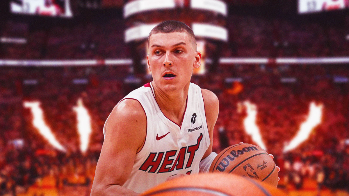 Miami Heat star Tyler Herro in front of Kaseya Center.