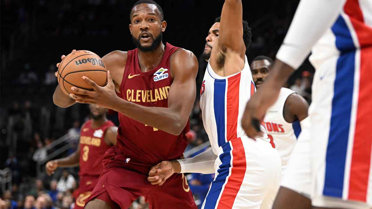 Cleveland Cavaliers forward Evan Mobley (4) controls the ball against the Detroit Pistons in the first quarter at Little Caesars Arena.