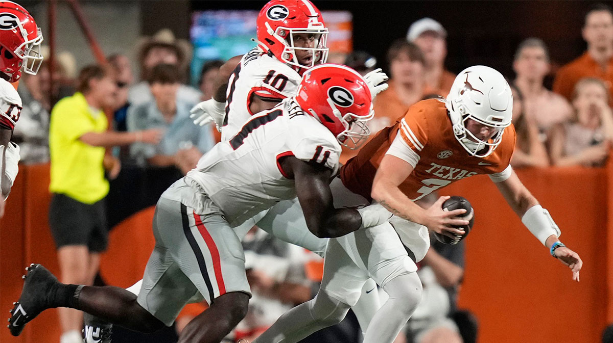 Georgia Bulldogs linebacker Jaylon Walker sacks Texas Longhorns cornerback Quinn Evers in the second quarter at Darrell K. Royal-Texas Memorial Stadium on Saturday, Oct. 19, 2024.