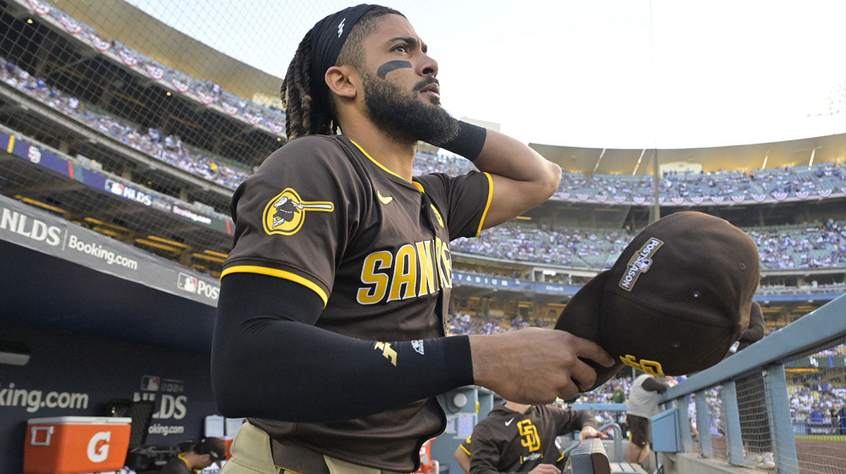 San Diego Padres outfielder Fernando Tatis Jr. (23) looks on from the dugout before game five against the Los Angeles Dodgers in the NLDS for the 2024 MLB Playoffs at Dodger Stadium.