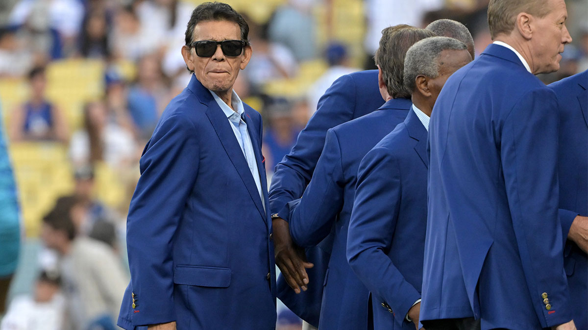 Former Los Angeles Dodgers pitcher Fernando Valenzuela looks on during a pre-game ceremony for former player Dusty Baker.