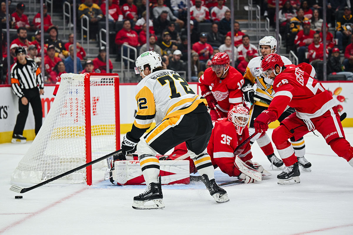 Pittsburgh Penguins left wing Anthony Beauvillier (72) scores a goal as Detroit Red Wings goaltender Ville Husso (35) tends the net during the first period at Little Caesars Arena.