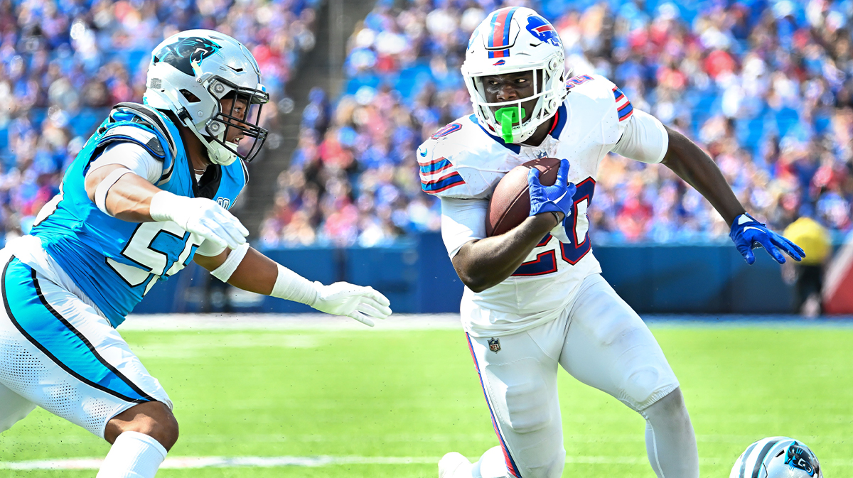 Aug 24, 2024; Orchard Park, New York, USA; Buffalo Bills running back Frank Gore Jr. (20) prepares for contact from Carolina Panthers defensive end Kenny Dyson Jr. (55) in the third quarter pre-season game at Highmark Stadium.