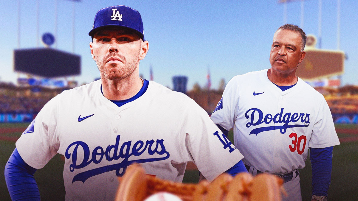 Freddie Freeman (Dodgers) looking serious with Dave Roberts in the background looking serious too