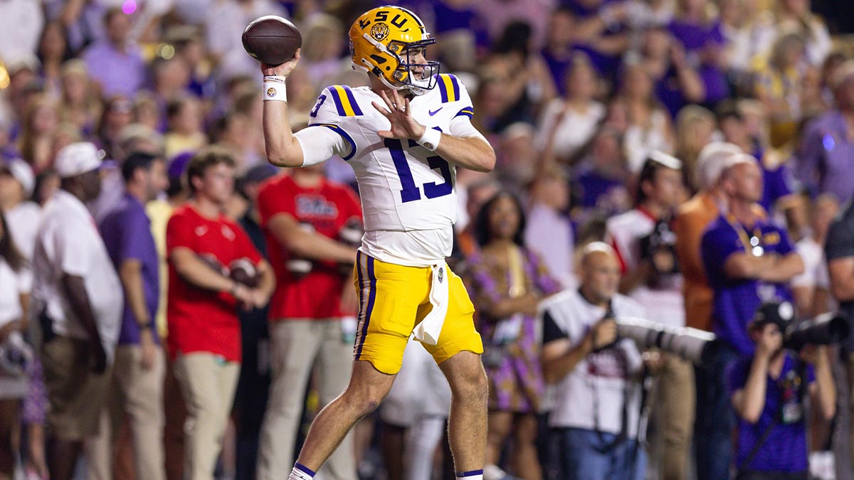 LSU Tigers quarterback Garrett Nussmeier (13) throws against the Mississippi Rebels during the first half at Tiger Stadium. 