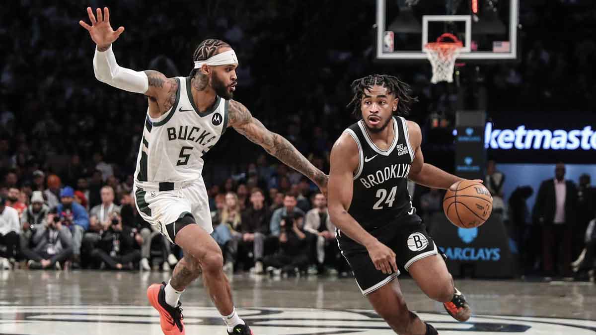 Brooklyn Nets guard Cam Thomas (24) drives past Milwaukee Bucks guard Gary Trent Jr. (5) in the fourth quarter at Barclays Center.