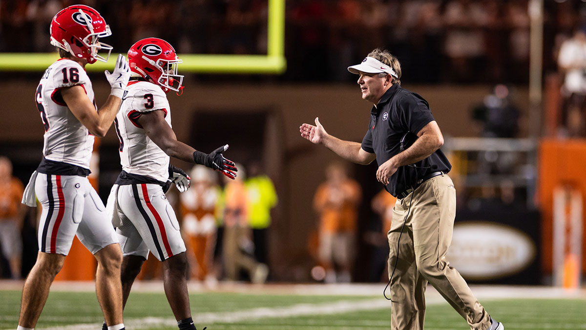 Georgia Bulldogs head coach Kirby Smart celebrates with his players during the second quarter against the Texas Longhorns at Darrell K Royal-Texas Memorial Stadium.