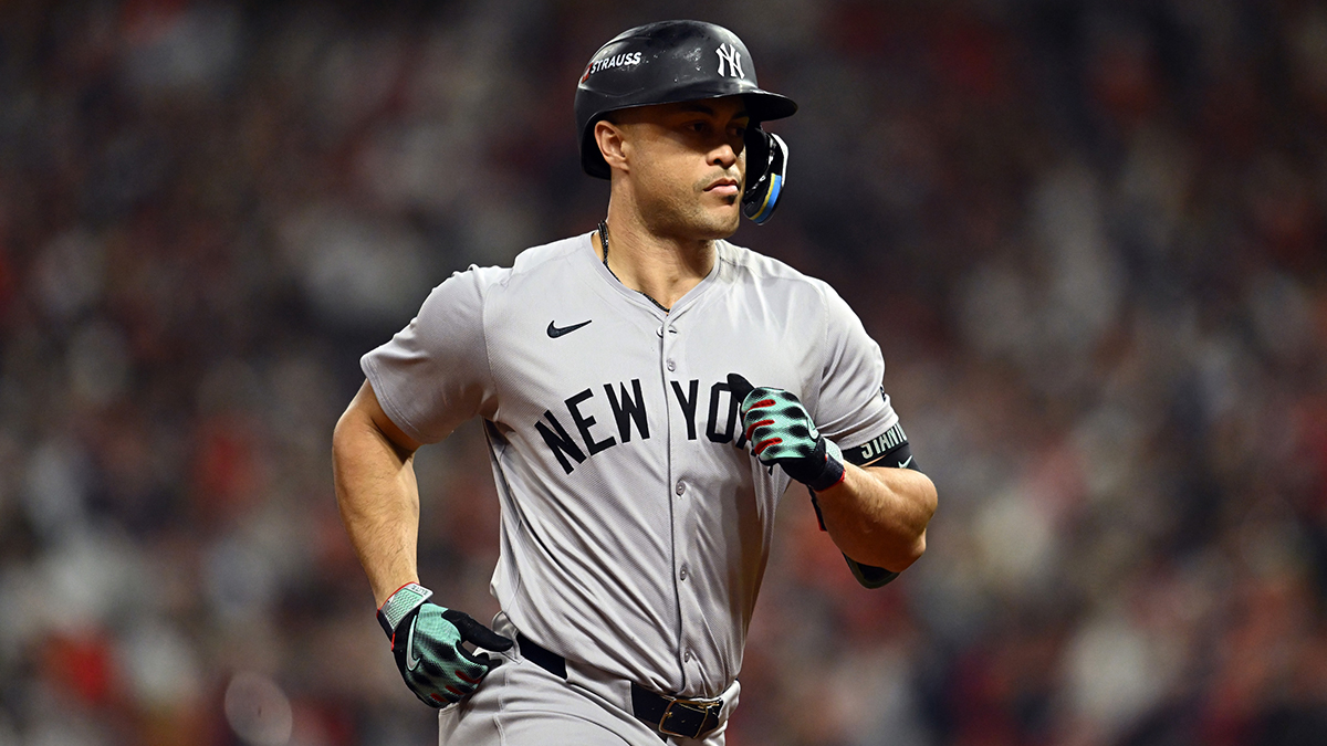  New York Yankees designated hitter Giancarlo Stanton (27) runs after hitting a three run home run in the sixth inning against the Cleveland Guardians during game four of the ALCS for the 2024 MLB playoffs at Progressive Field. 