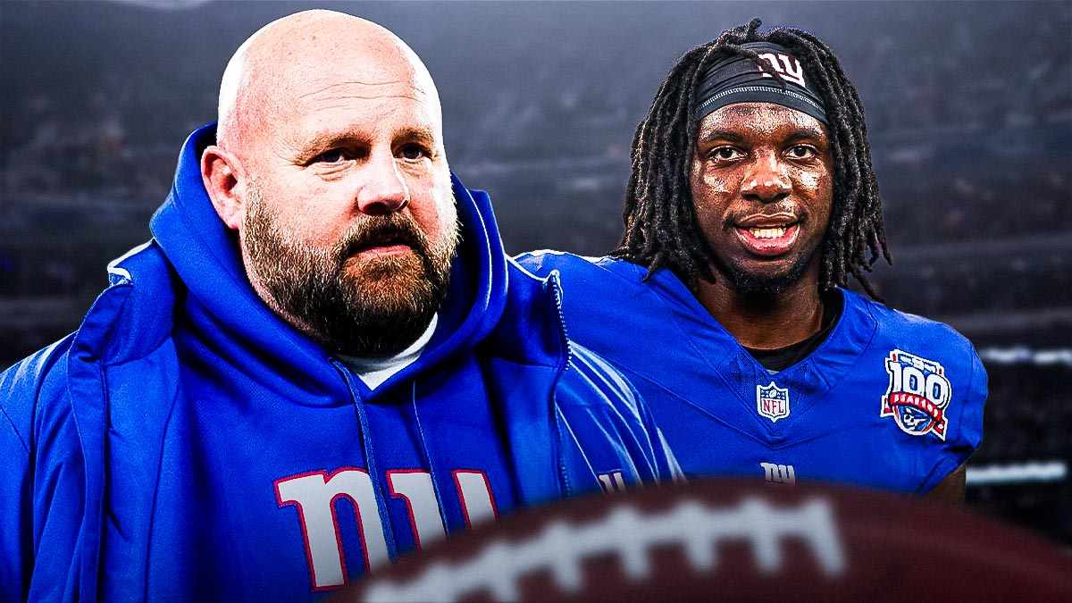 Brian Daboll beside Deonte Banks