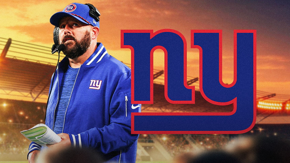 Brian Daboll Giants logo in the background.