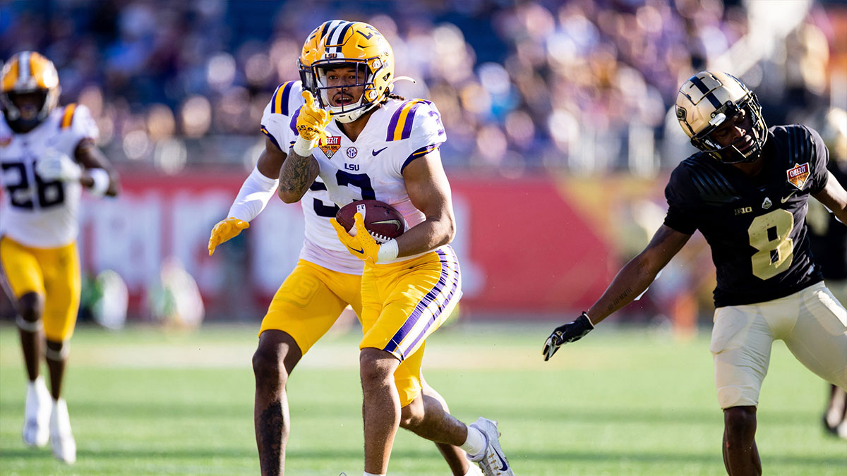 LSU Tigers safety Greg Brooks Jr. (3) gestures after an interception during the second half against the Purdue Boilermakers at Camping World Stadium.