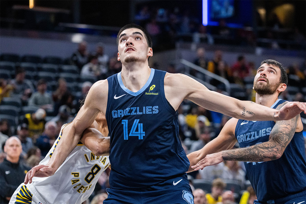 Grizzlies center Zach Edey (14) boxes out Indiana Pacers forward Enrique Freeman (8) in the second half at Gainbridge Fieldhouse