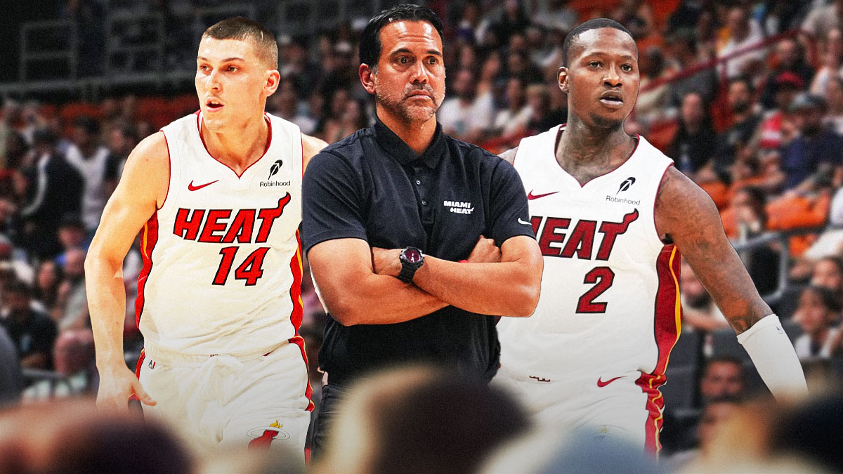 Miami Heat head coach Erik Spoelstra in the middle of Tyler Herro and Terry Rozier in front of Kaseya Center.