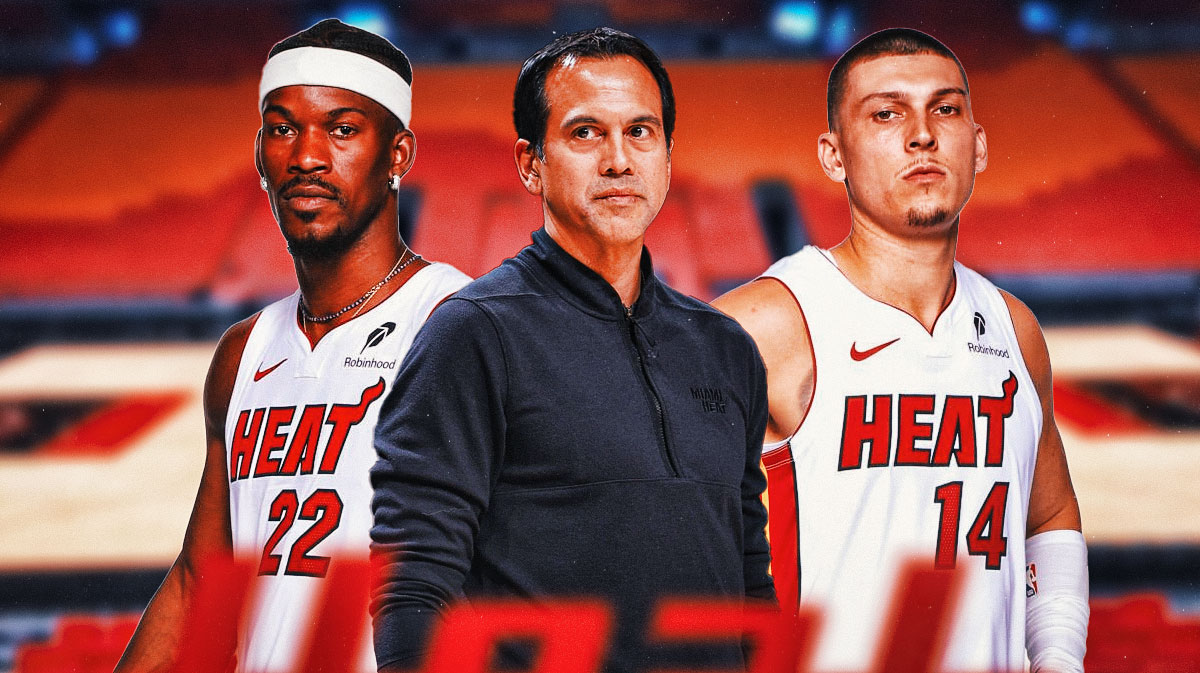 Miami Heat head coach Erik Spoelstra in the middle with Jimmy Butler and Tyler Herro on either side in front of Kaseya Center.