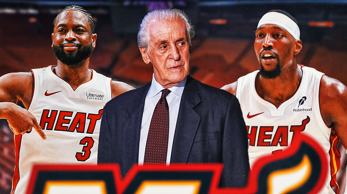 Miami Heat president Pat Riley in the center with Bam Adebayo and Dwyane Wade on either side in front of Kaseya Center.