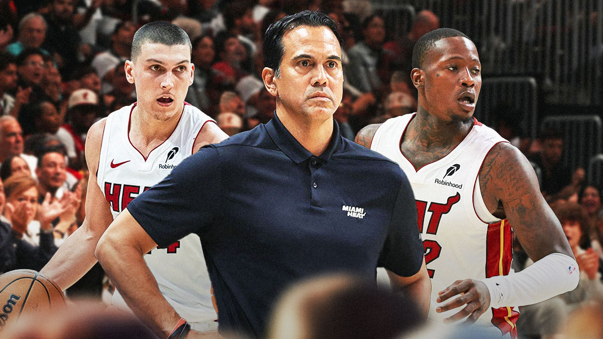 Miami Heat head coach Erik Spoelstra in the middle of Tyler Herro and Terry Rozier in front of Kaseya Center.