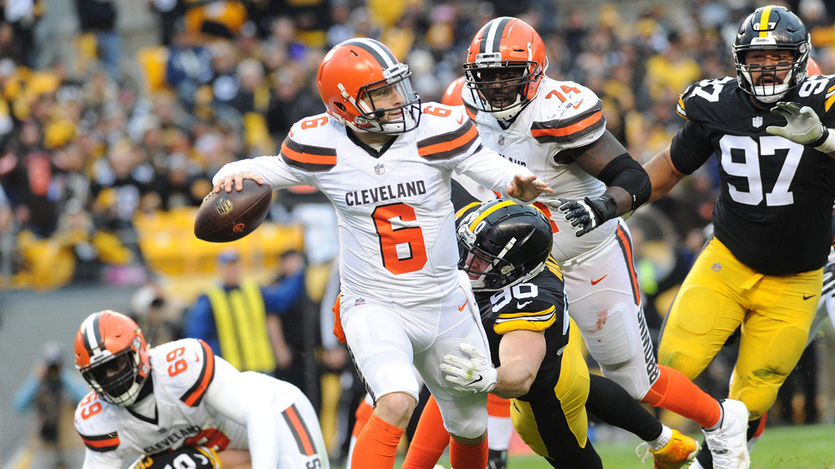 Cleveland Browns quarterback Baker Mayfield (6) is pressured by Pittsburgh Steelers linebacker T.J. Watt (90) in the third quarter at Heinz Field. The Steelers won 33-18.
