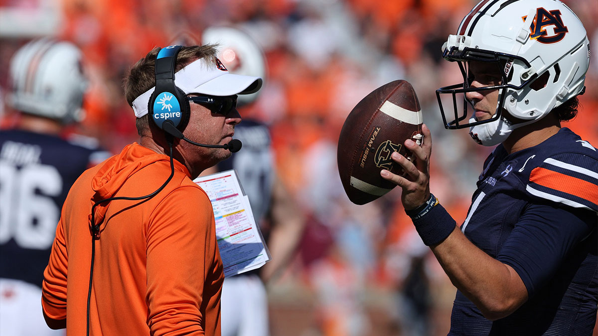 Hugh Freeze with Payton Thorne.