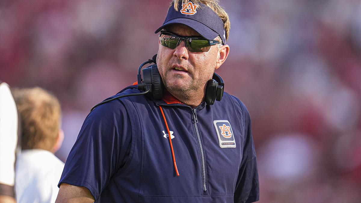 Auburn Tigers head coach Hugh Freeze on the field against the Georgia Bulldogs at Sanford Stadium.