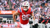 New England Patriots tight end Hunter Henry (85) runs for a touchdown against the Houston Texans during the second half at Gillette Stadium.