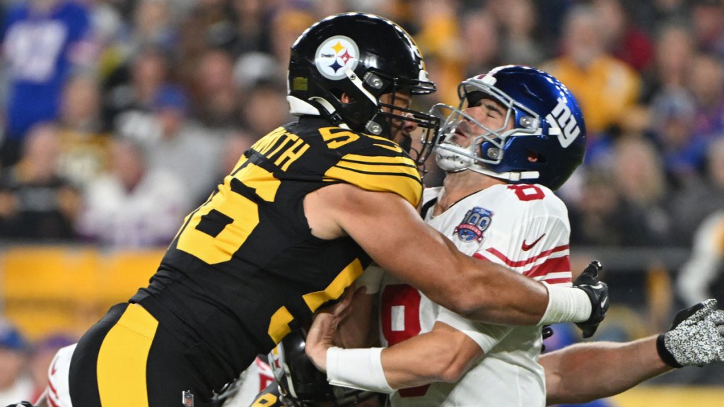 New York Giants quarterback Daniel Jones (8) is hit by Pittsburgh Steelers linebacker Alex Highsmith (56) during the first quarter at Acrisure Stadium.