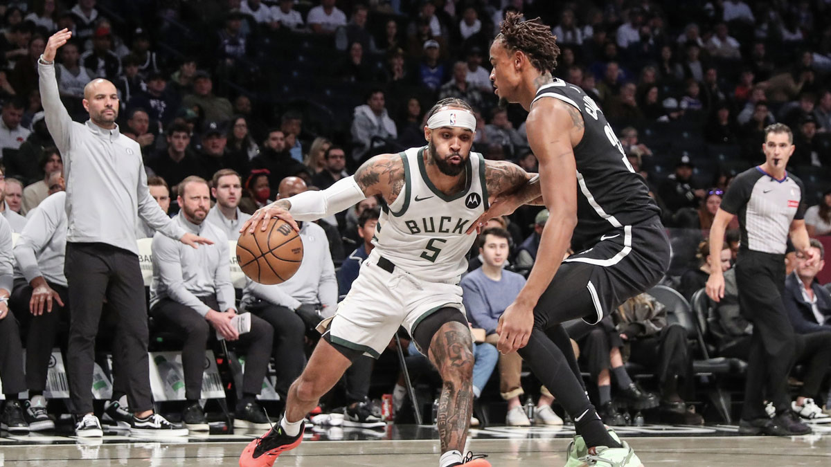 Milwaukee Bucks guard Gary Trent Jr. (5) looks to drive past Brooklyn Nets center Nic Claxton (33) in the third quarter at Barclays Center.