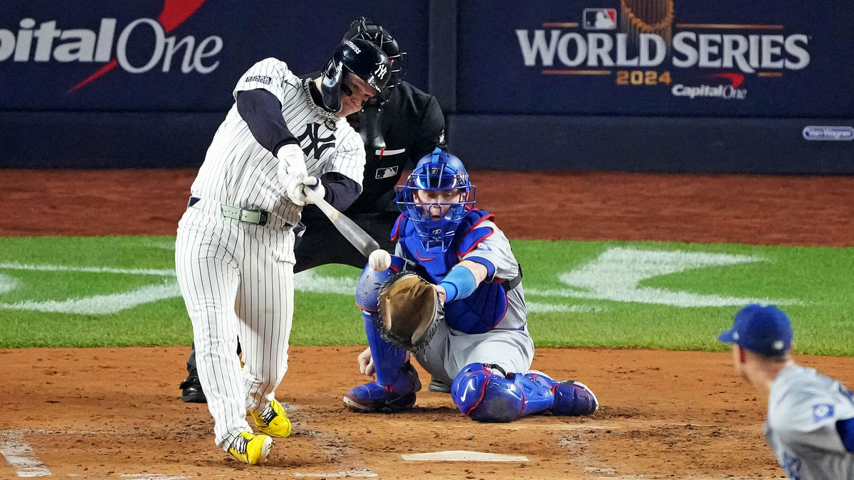 New York Yankees outfielder Alex Verdugo (24) hits an RBI single during the second inning against the Los Angeles Dodgers in game four of the 2024 MLB World Series at Yankee Stadium. 