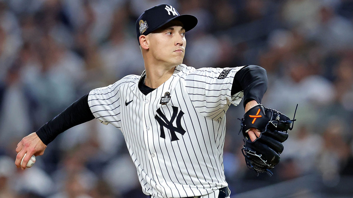 Oct 30, 2024; New York, New York, USA; New York Yankees pitcher Luke Weaver (30) pitches during the ninth inning against the Los Angeles Dodgers in game four of the 2024 MLB World Series at Yankee Stadium. Mandatory Credit: Brad Penner-Imagn Images