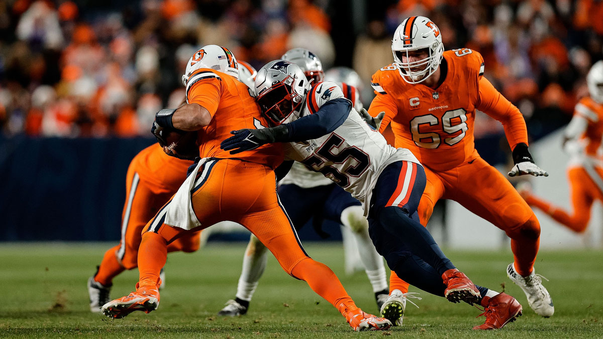 Denver Broncos quarterback Russell Wilson (3) is sacked by New England Patriots linebacker Josh Uche (55) as offensive tackle Mike McGlinchey (69) defends