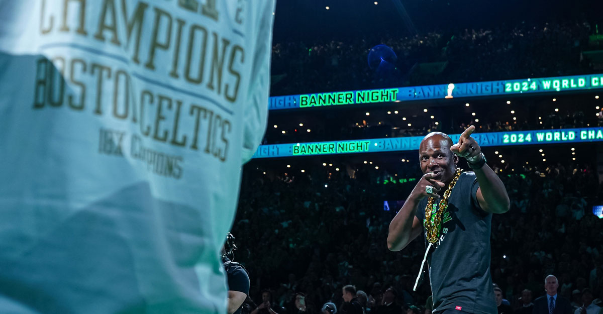 Former NBA Champion and Boston Celtics player Ray Allen walks onto the court during the opening night banner raising ceremony before the start of the game against the New York Knicks at TD Garden