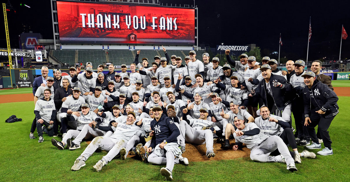 The New York Yankees celebrates after beating the Cleveland Guardians during game five of the ALCS for the 2024 MLB playoffs at Progressive Field.