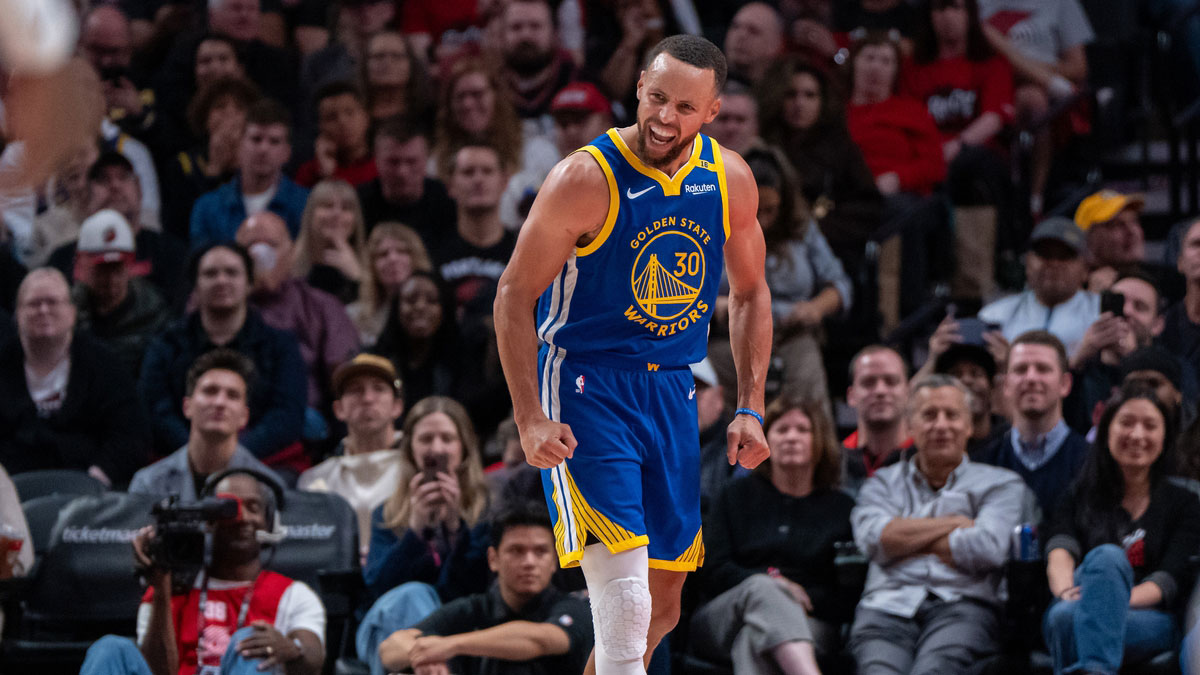 Golden State Warriors point guard Stephen Curry (30) reacts during the second half against the Portland Trailblazers at Moda Center.