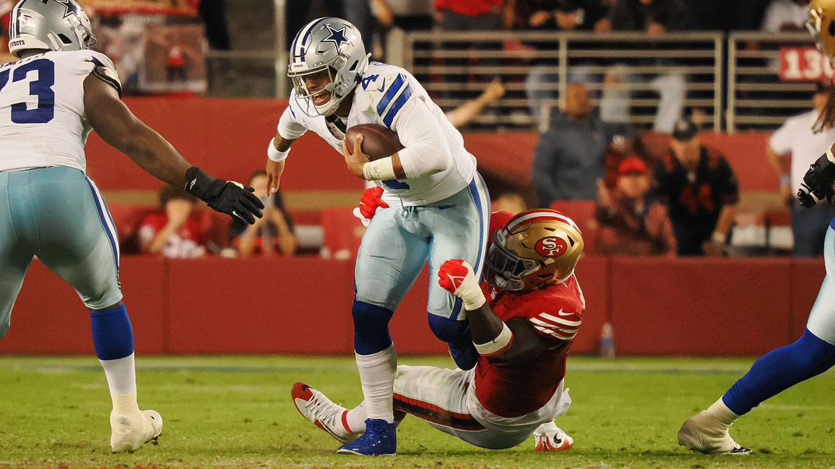 San Francisco 49ers defensive lineman Sam Okuayinonu (91) sacks Dallas Cowboys quarterback Dak Prescott (4) during the fourth quarter at Levi's Stadium.