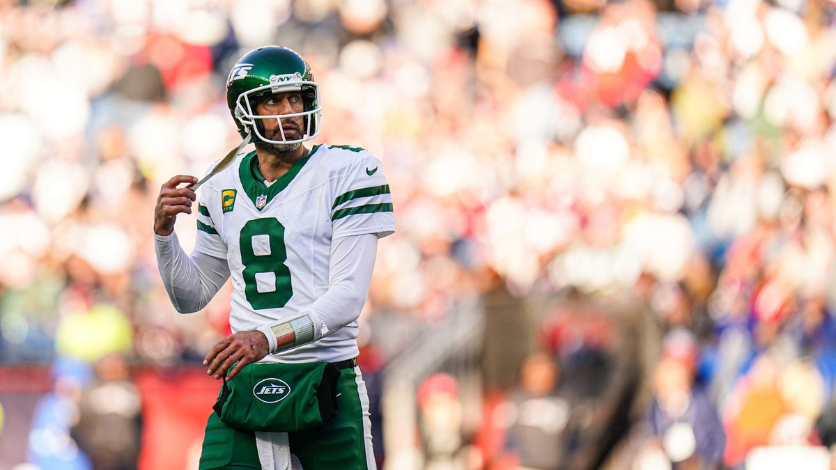 New York Jets quarterback Aaron Rodgers (8) on the field against the New England Patriots in the second half at Gillette Stadium.