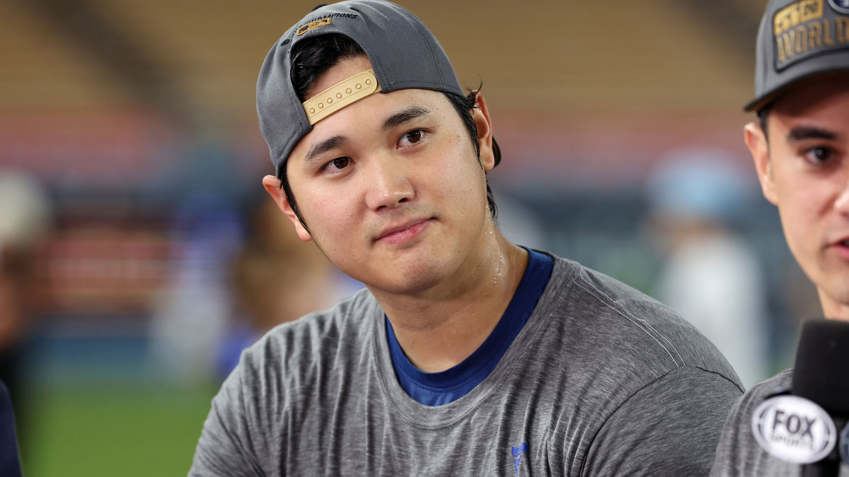 Los Angeles Dodgers designated hitter Shohei Ohtani (17) looks on in an interview after the Los Angeles Dodgers defeated the New York Mets in game six of the NLCS to advance to the World Series in the 2024 MLB playoffs at Dodger Stadium.