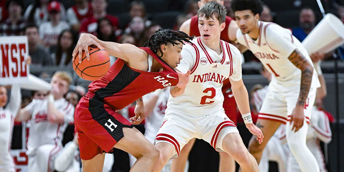 Indiana Hoosiers guard Gabe Cupps (2) defends Harvard Crimson guard Malik Mack (2) during the game against Harvard in Gainbridge Fieldhouse in Indianapolis, Ind. on Sunday, Nob. 26, 2023.