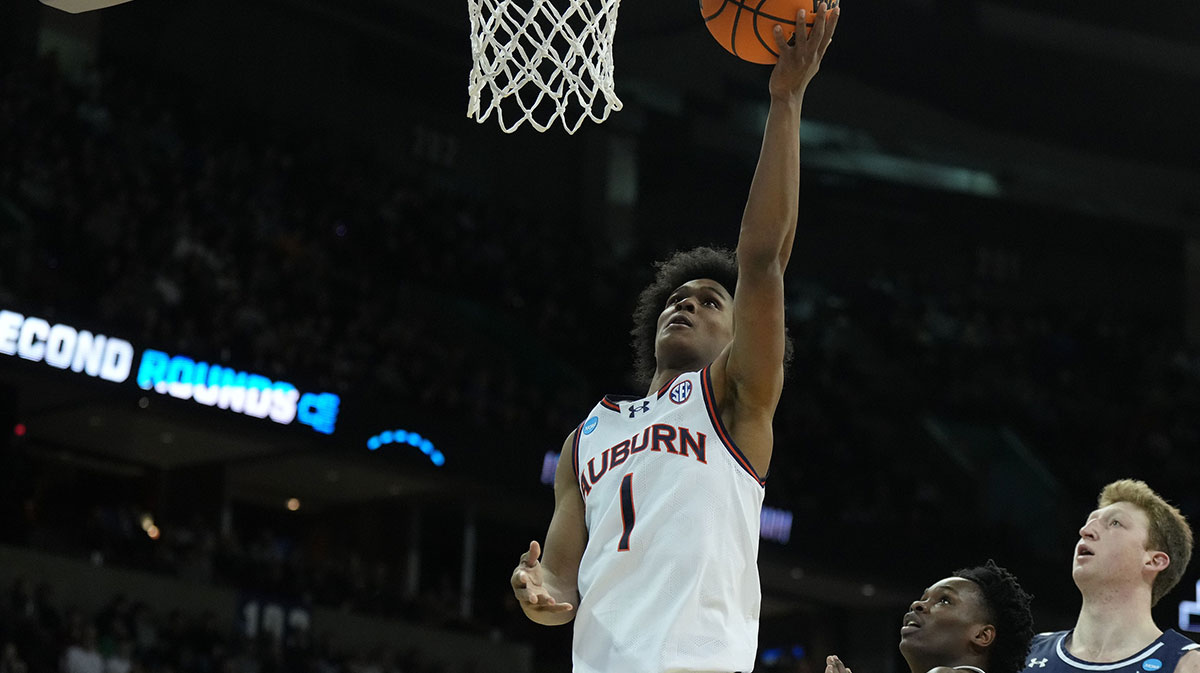 Auburn Tigers guard Aden Holloway (1) attempts a layup against the Yale Bulldogs during the first half of a game in the first round of the 2024 NCAA Tournament at Spokane Veterans Memorial Arena.