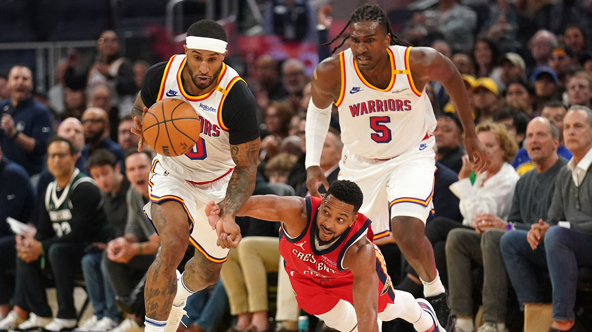 Golden State Warriors guard Gary Payton II (0) steals the ball from New Orleans Pelicans guard CJ McCollum (3) in the second quarter at the Chase Center.